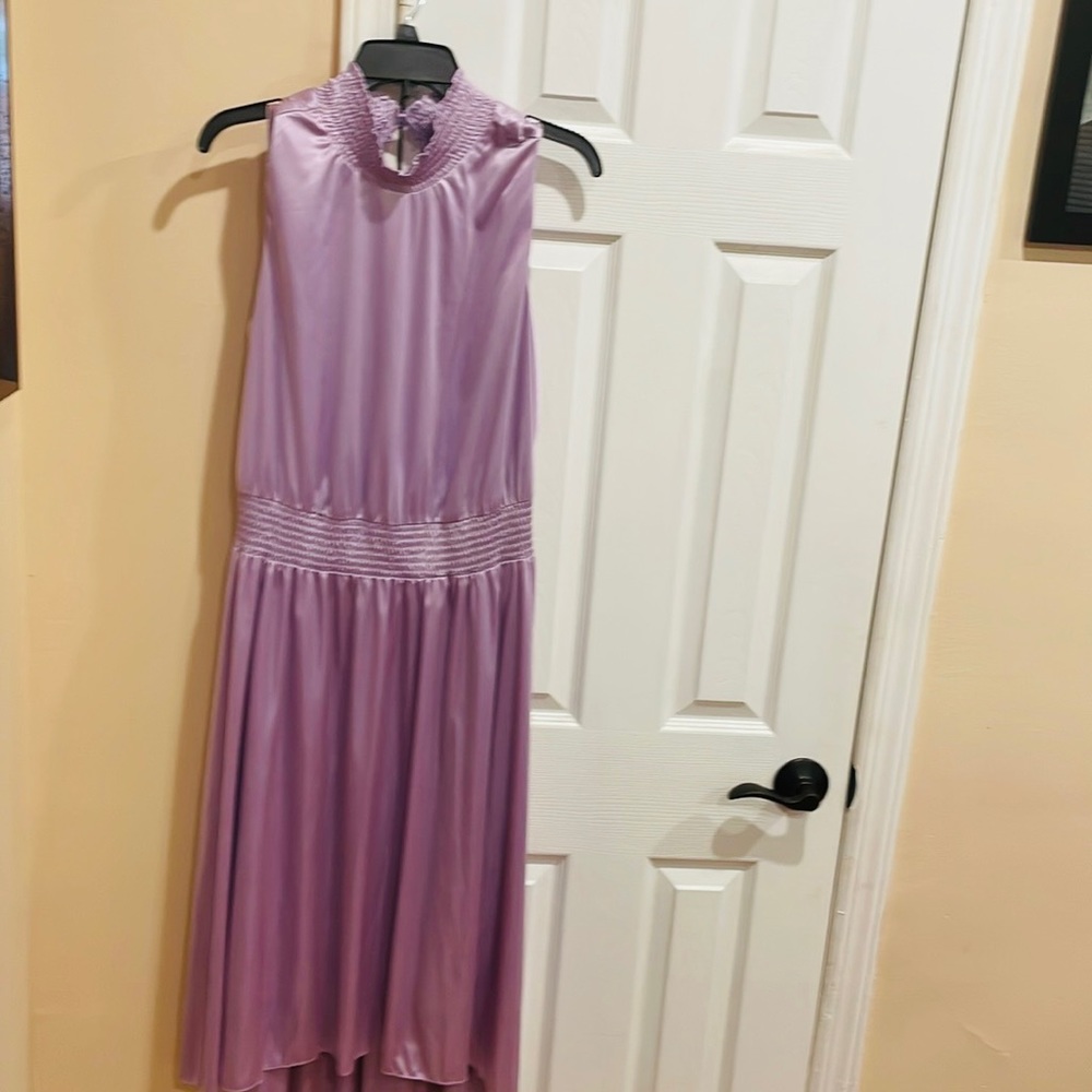 Orchid bloom pretty sleeveless dress size 14 has three buttons from the back